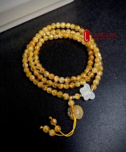 [Hàng Vip] Chuỗi vòng tay đá Thạch Anh tóc vàng mix charm túi tiền size hạt 06 li dành cho nữ mệnh Thổ - mệnh Kim