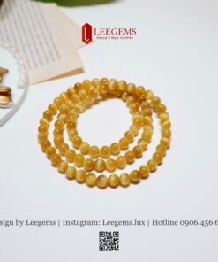 Alternative view of Chuỗi Vòng Tay Mắt Hổ Vàng Tâm VIP 5,5–6li – Tài Lộc & Bản Lĩnh